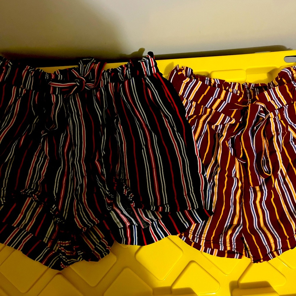 2 cute summer shorts the material is light .